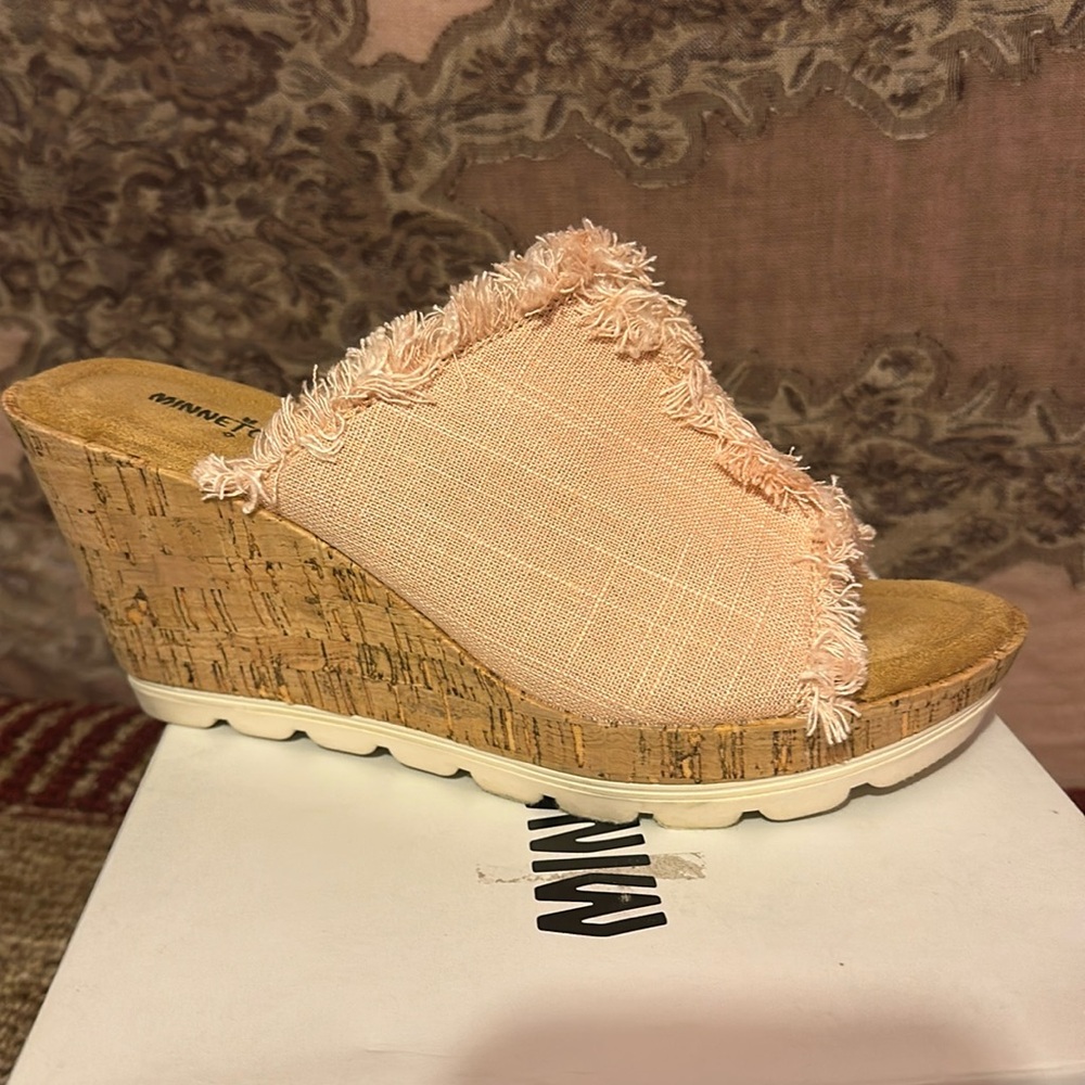 Cute blush colored mule by Minnetonka size 10